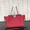 Valentino Rockstud Rolling Red with turquoise stone